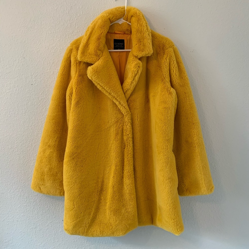 Big mustard yellow faux fur coat.